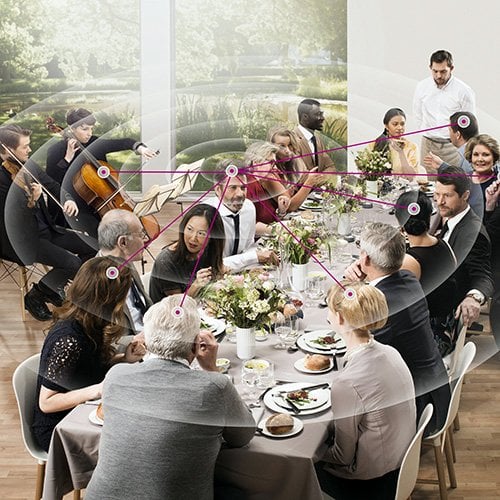 people in dining room with graphic overlaid representing unfocused hearing